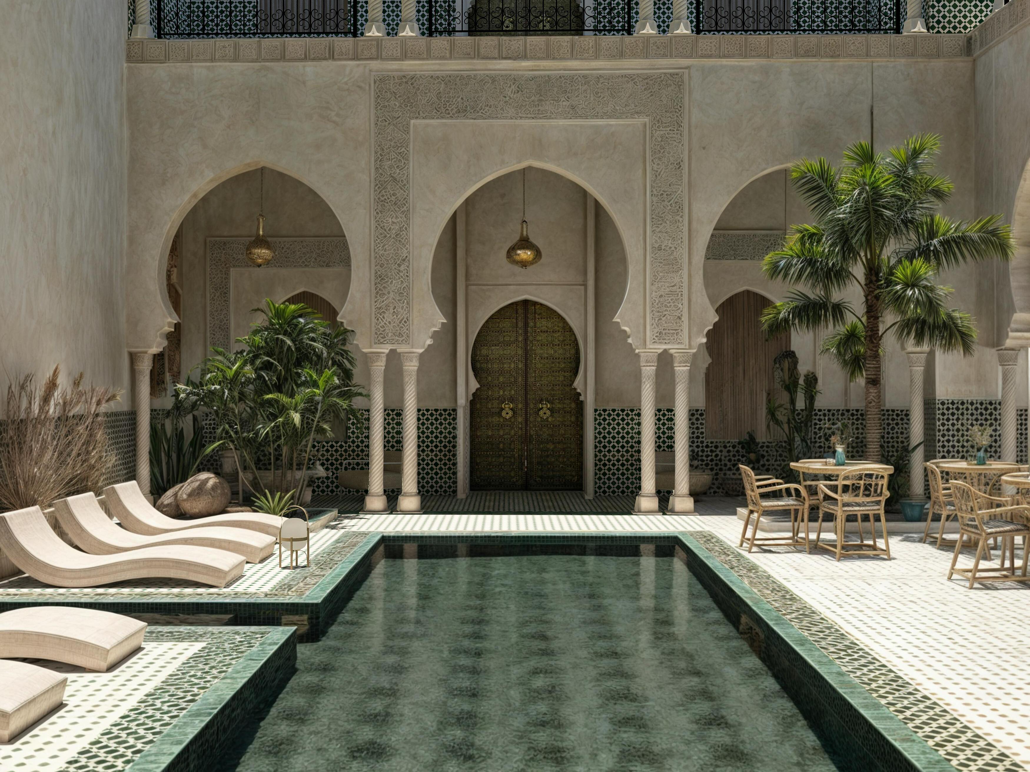 Beautiful Moroccan riad courtyard with traditional architecture and pool